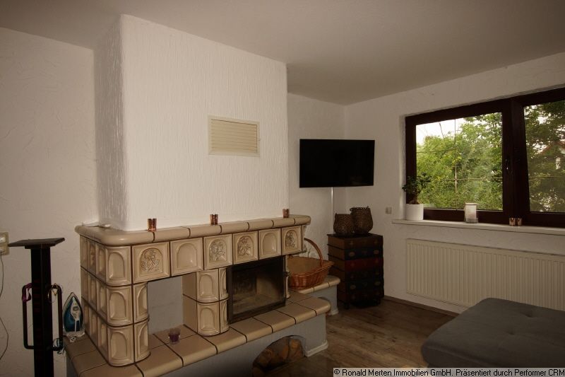 Immobilienmakler Erfurt: Wohnzimmer mit Kamin