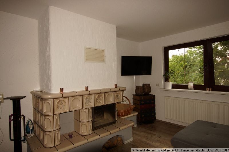 Immobilienmakler Erfurt: Wohnzimmer mit Kamin