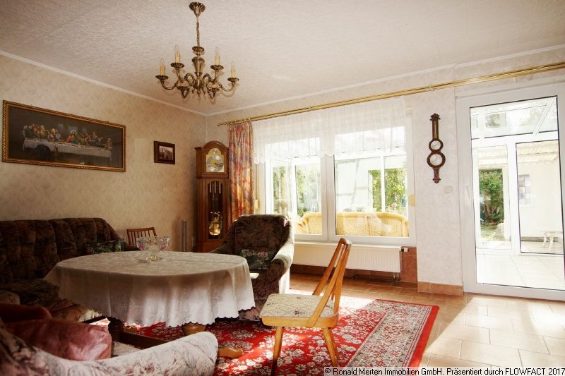 Immobilienmakler Erfurt: Wohnzimmer mit Wintergarten