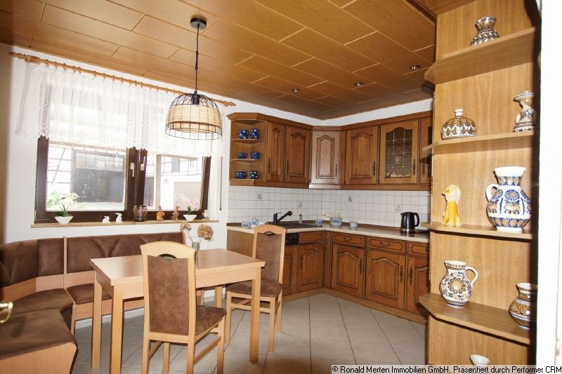 Immobilienmakler Erfurt: EG Wohn-Küche Bild 1