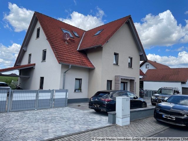 Immobilien-Angebots-Titel: zwei hochwertig ausgestattete Doppelhaushälften mit Garten, Carport und Stellplatz - vermietet-Thumbnail