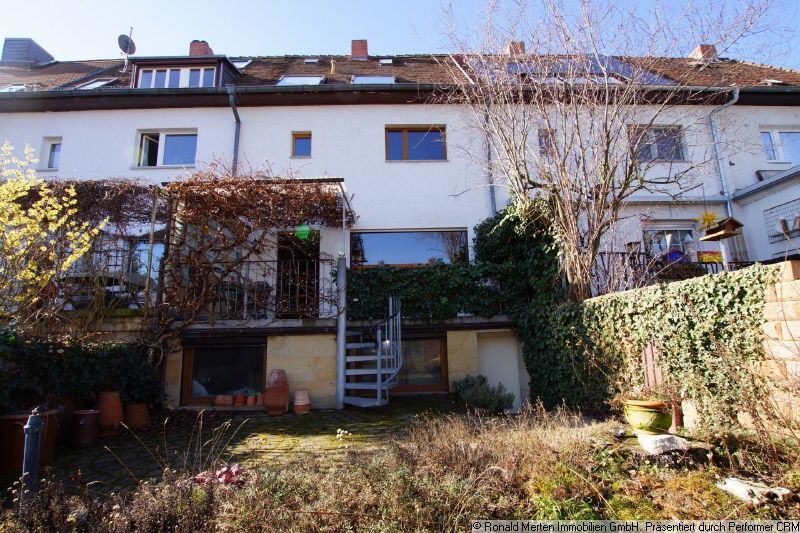 Immobilienmakler Erfurt: Garten Rückansicht mit Terrasse